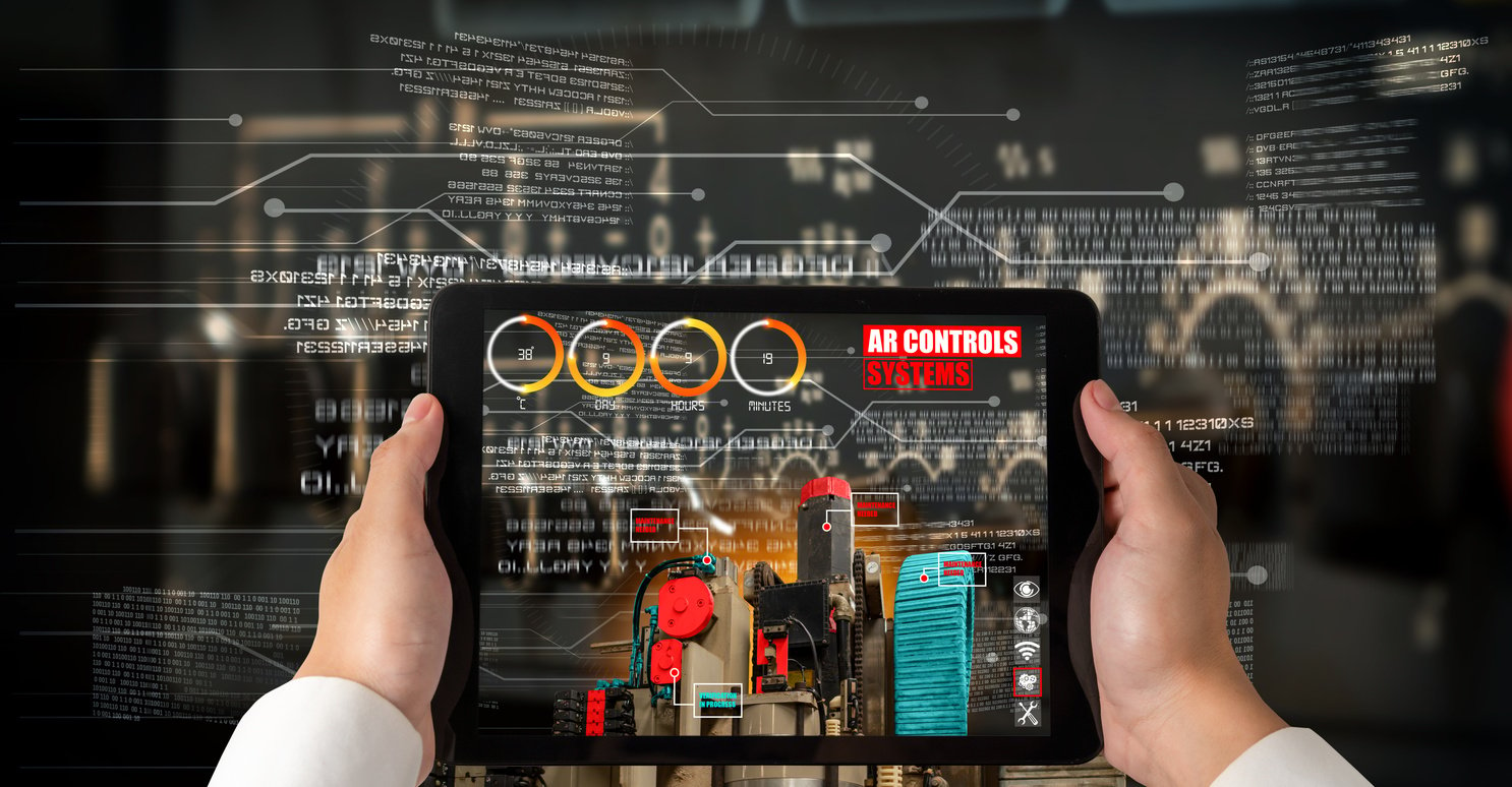 Engineer use augmented reality software in smart factory production line